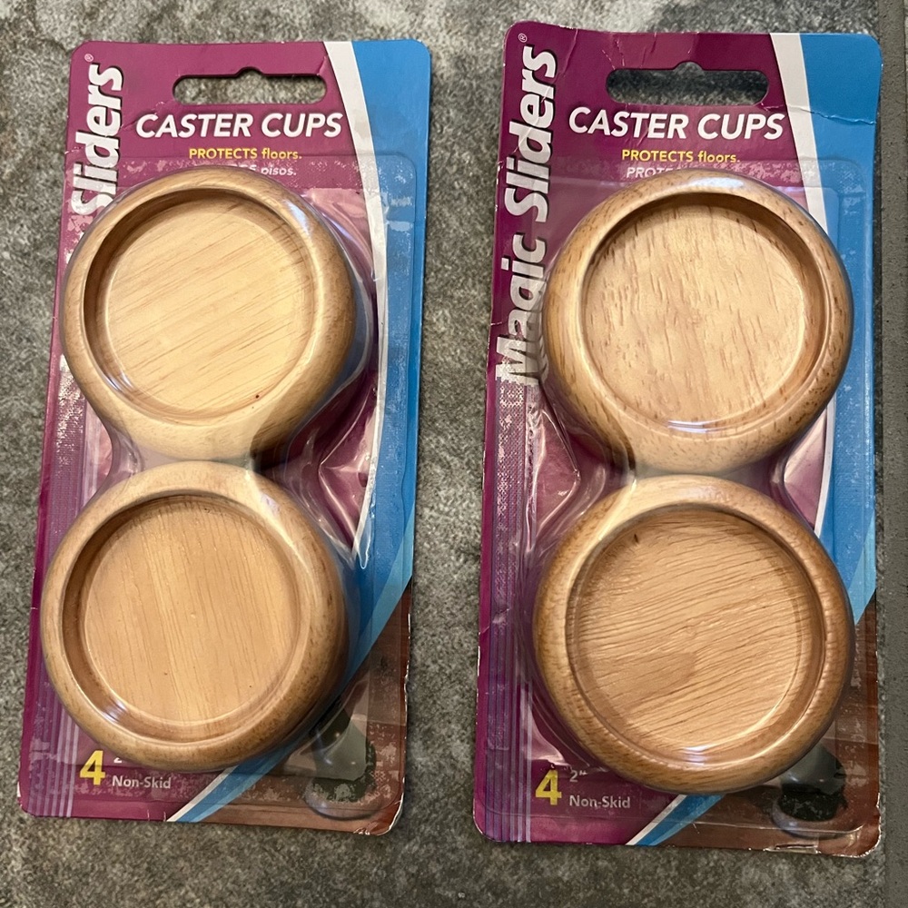 2 packages of Magic Sliders oak Caster Cups. Total=8 individual sliders. NWOT